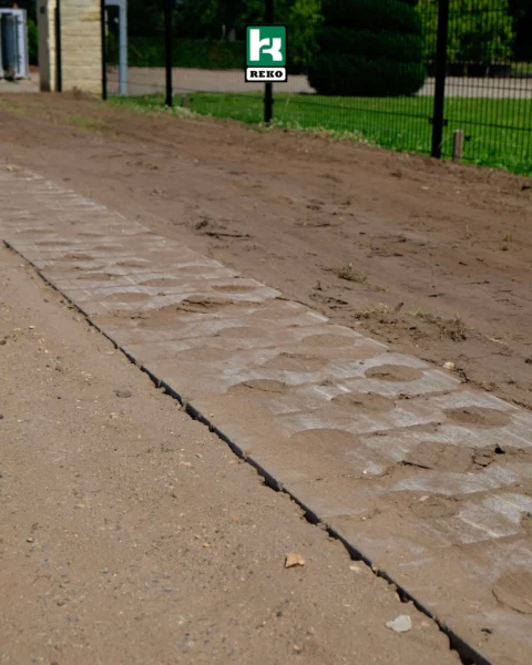 Herleggen grasbetonstenen Wittepalenweg